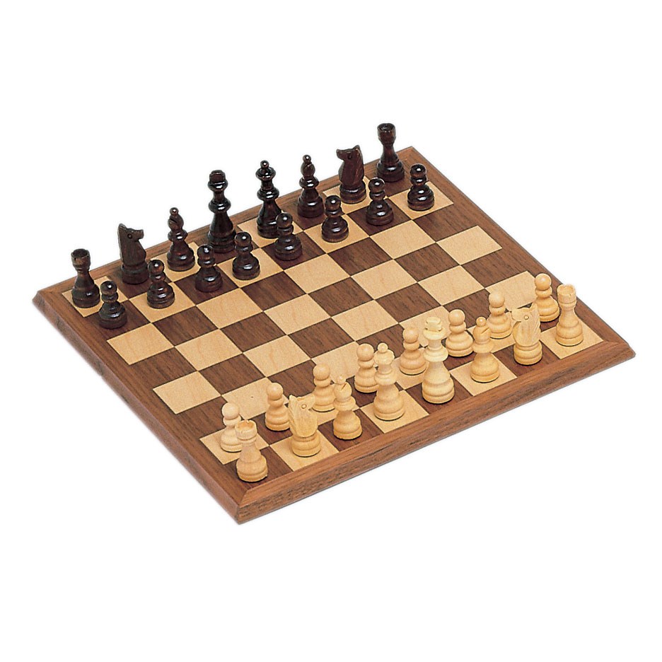 Close up of a wooden chess board with pieces mid game
